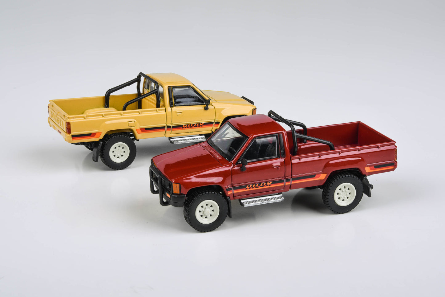 1:64 1984 Toyota Hilux Single Cab
Yellow / Red