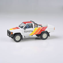 Load image into Gallery viewer, 1:64 1984 Toyota Hilux Single Cab TRD Pro Ironman
