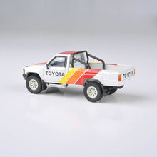 Load image into Gallery viewer, 1:64 1984 Toyota Hilux Single Cab TRD Pro Ironman
