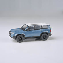Load image into Gallery viewer, 1:64 2024 Toyota Land Cruiser 250 Prado Heritage Blue / White Ice Cap
