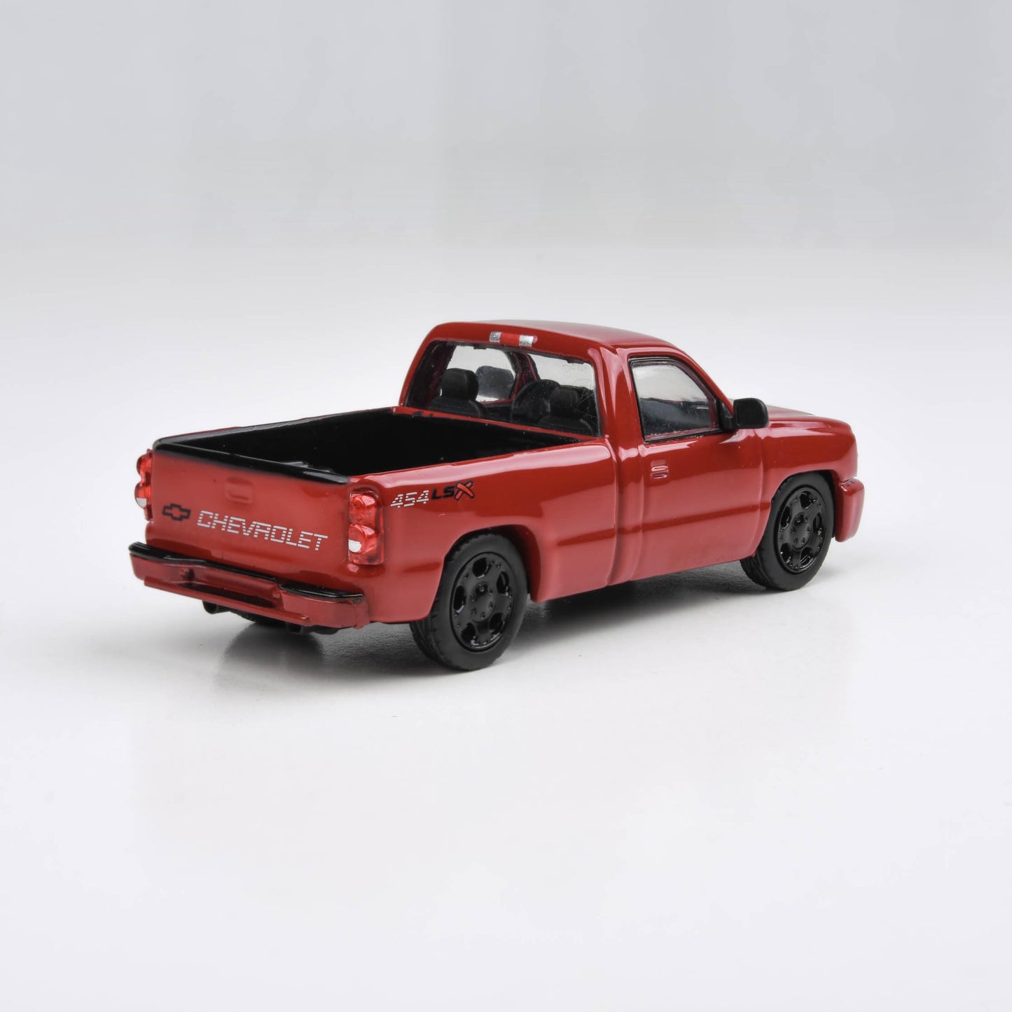 1:64 2006 Chevrolet Silverado 'Cateye' Onyx Black / Victory Red