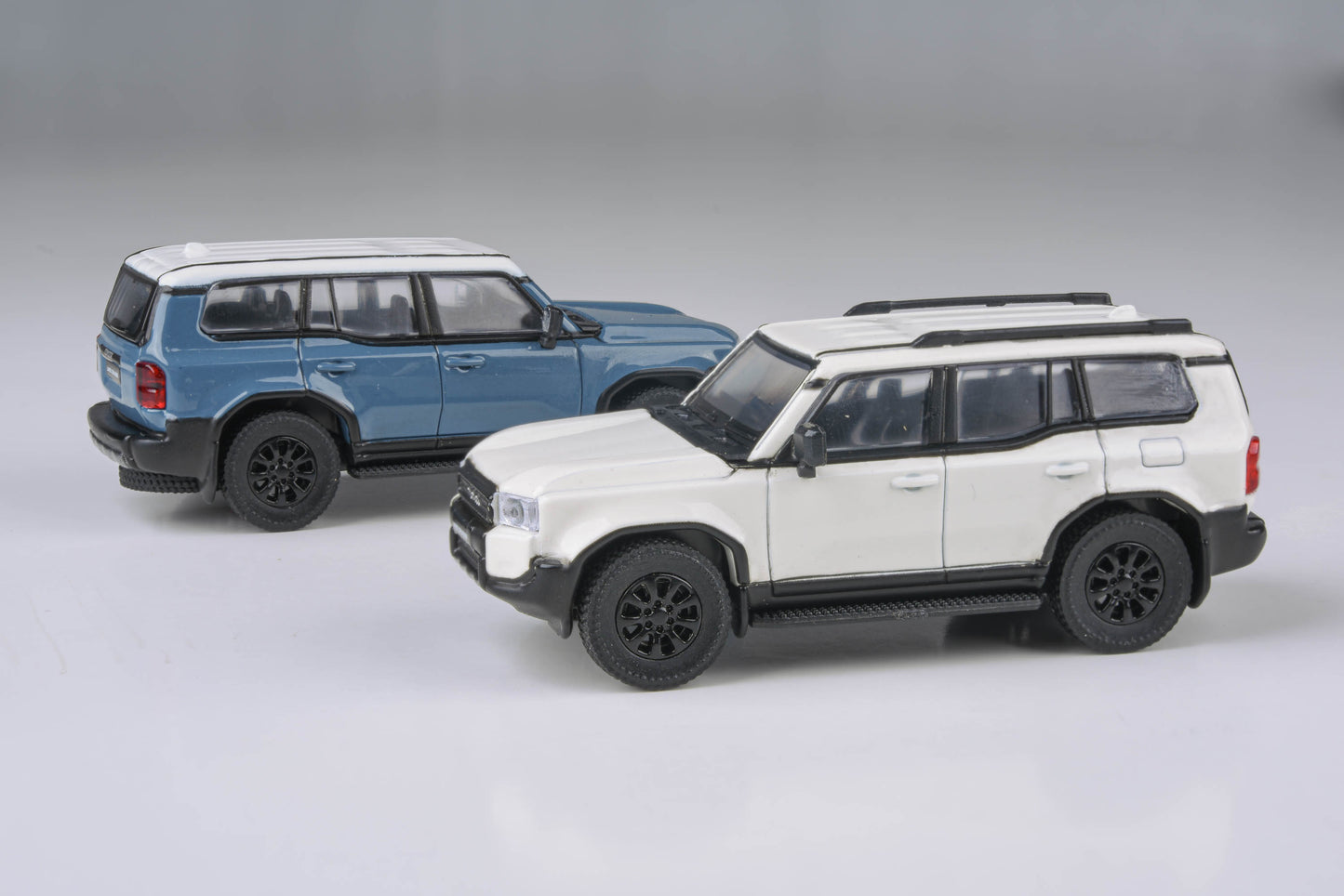 1:64 2024 Toyota Land Cruiser 250 Prado Heritage Blue / White Ice Cap