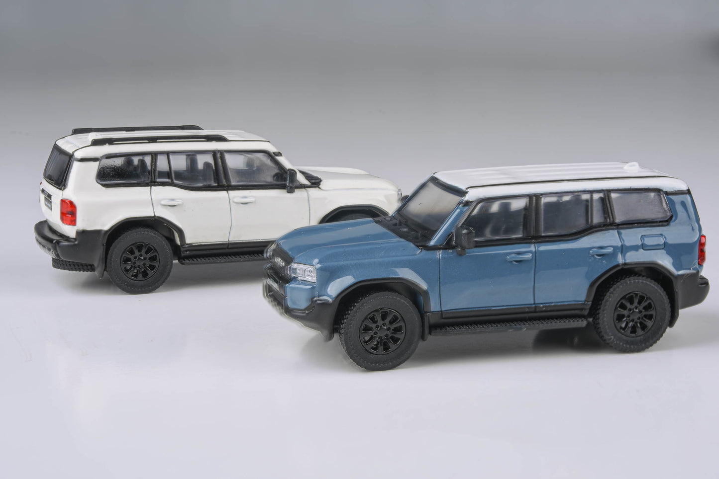 1:64 2024 Toyota Land Cruiser 250 Prado Heritage Blue / White Ice Cap