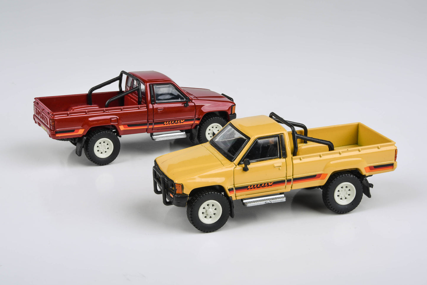 1:64 1984 Toyota Hilux Single Cab Yellow / Red