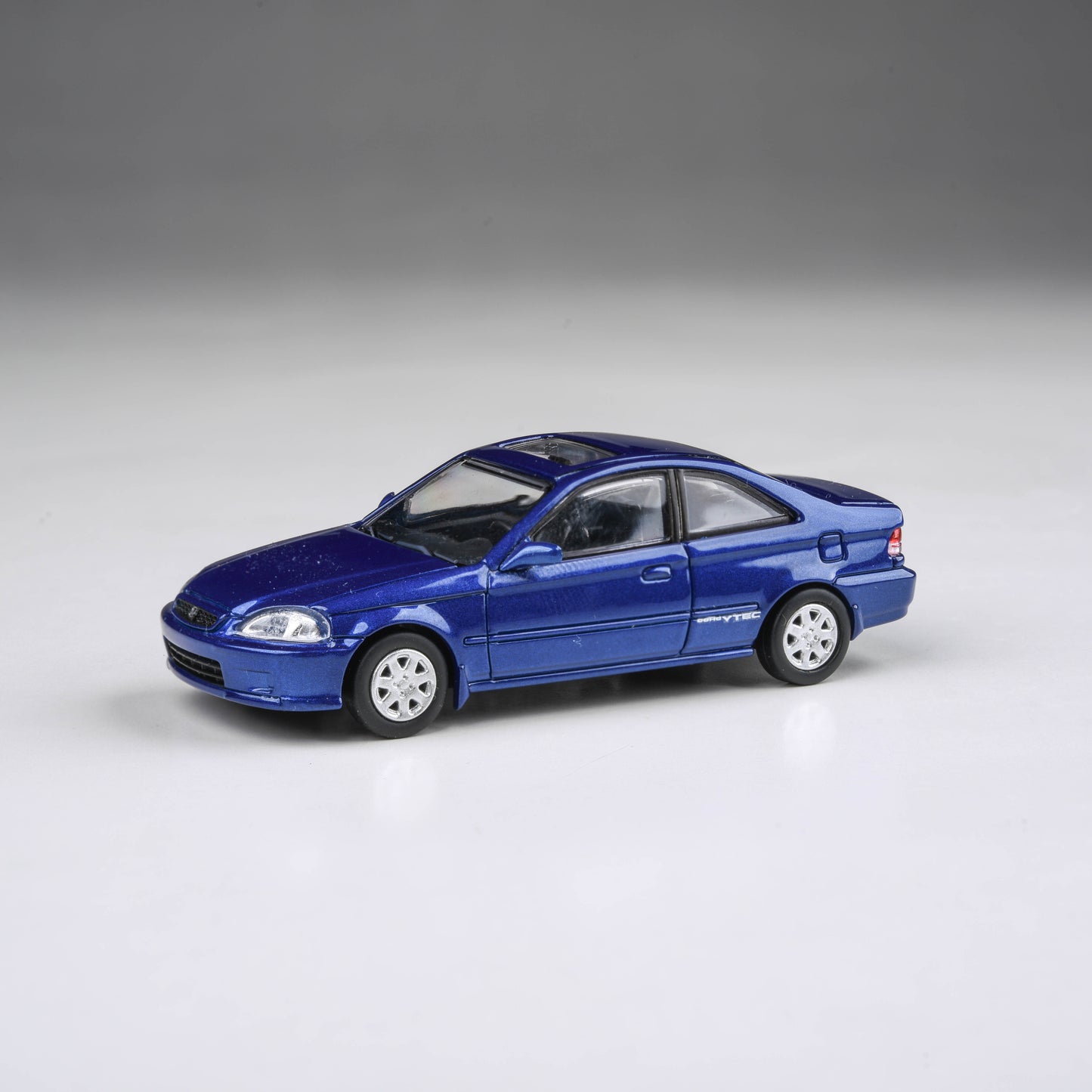 1:64 1999 Honda Civic Si Coupe EM1 Electron Blue Pearl  (wingless)