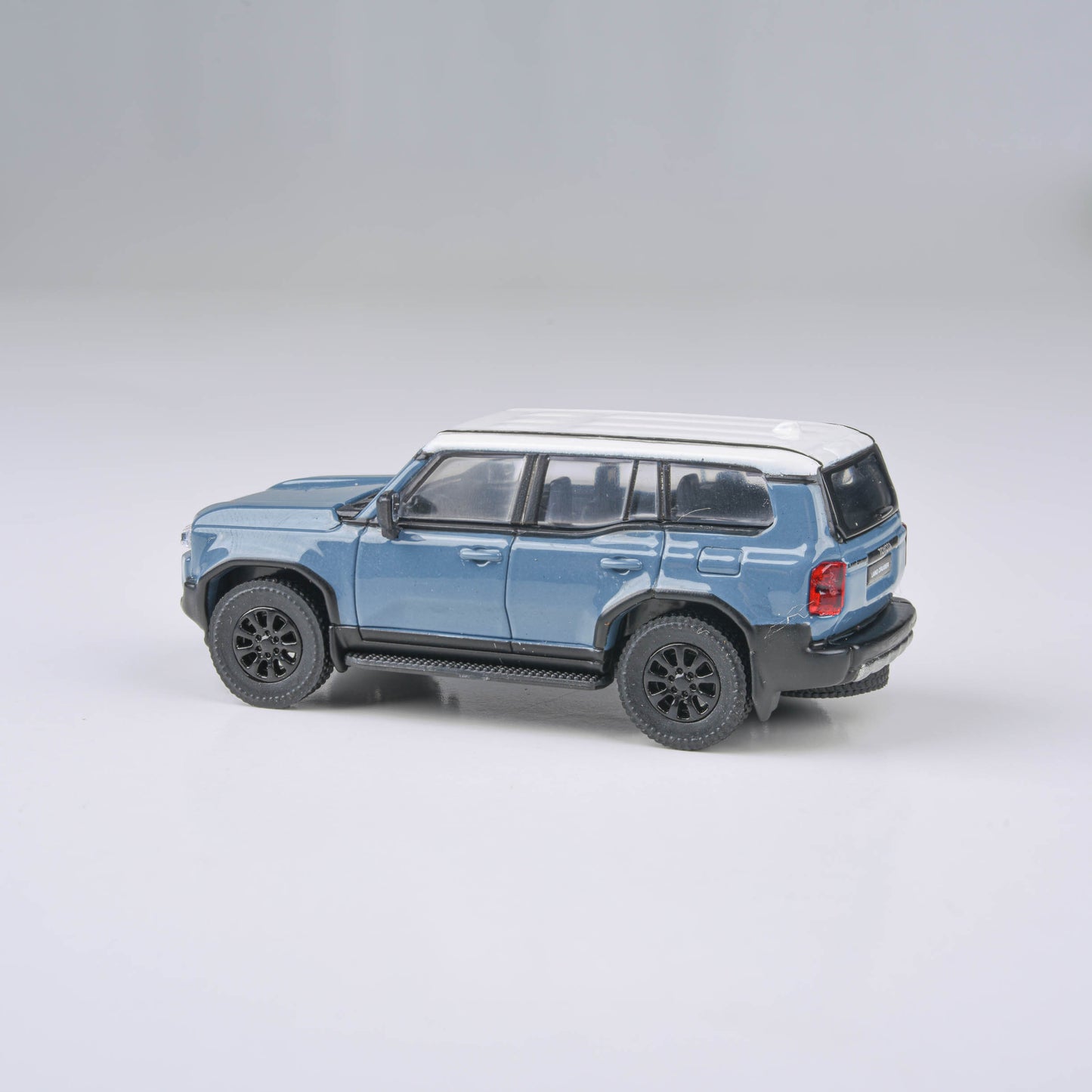 1:64 2024 Toyota Land Cruiser 250 Prado Heritage Blue / White Ice Cap