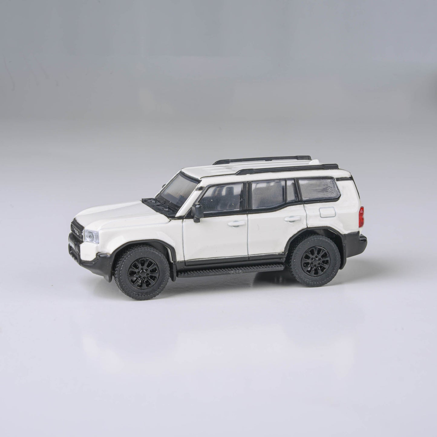 1:64 2024 Toyota Land Cruiser 250 Prado Heritage Blue / White Ice Cap