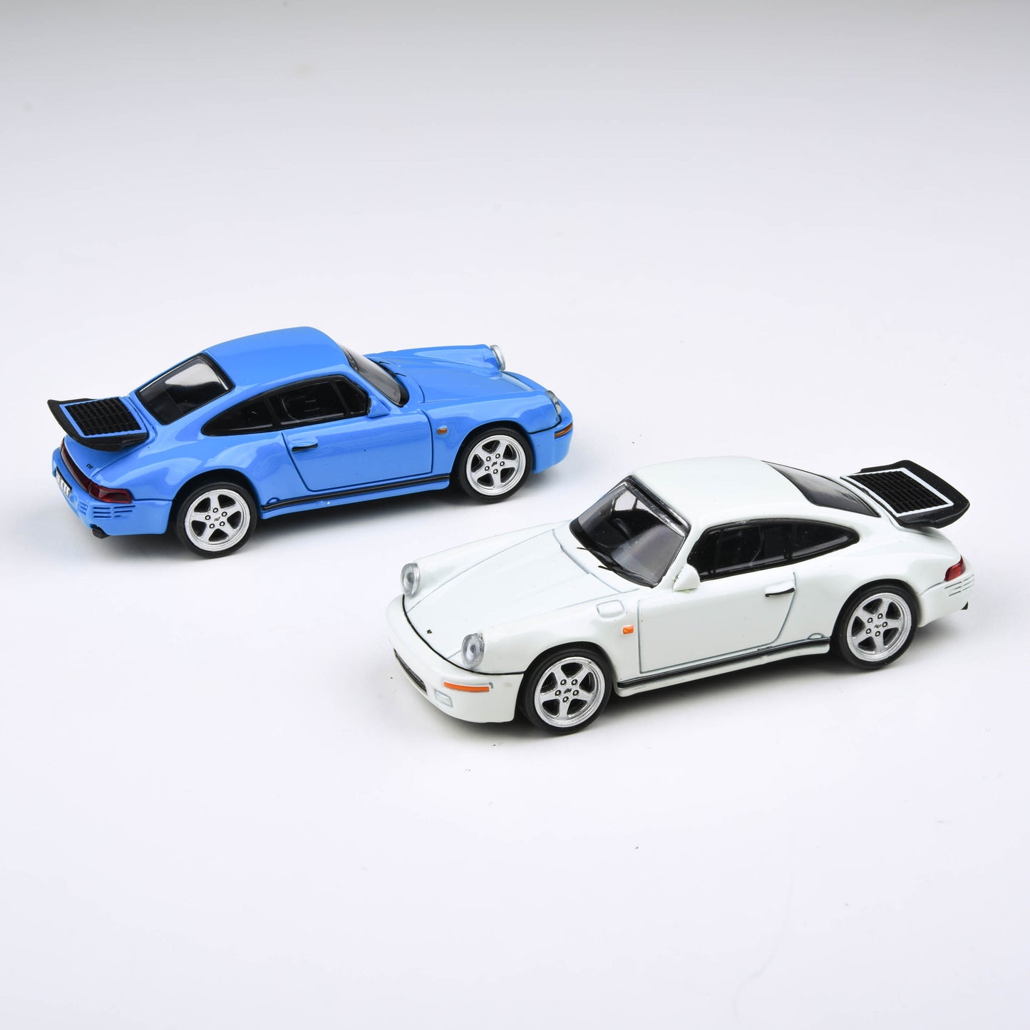 1:64 RUF 1987 CTR Yellowbird - Grand Prix White / Rennsport Racing Blue