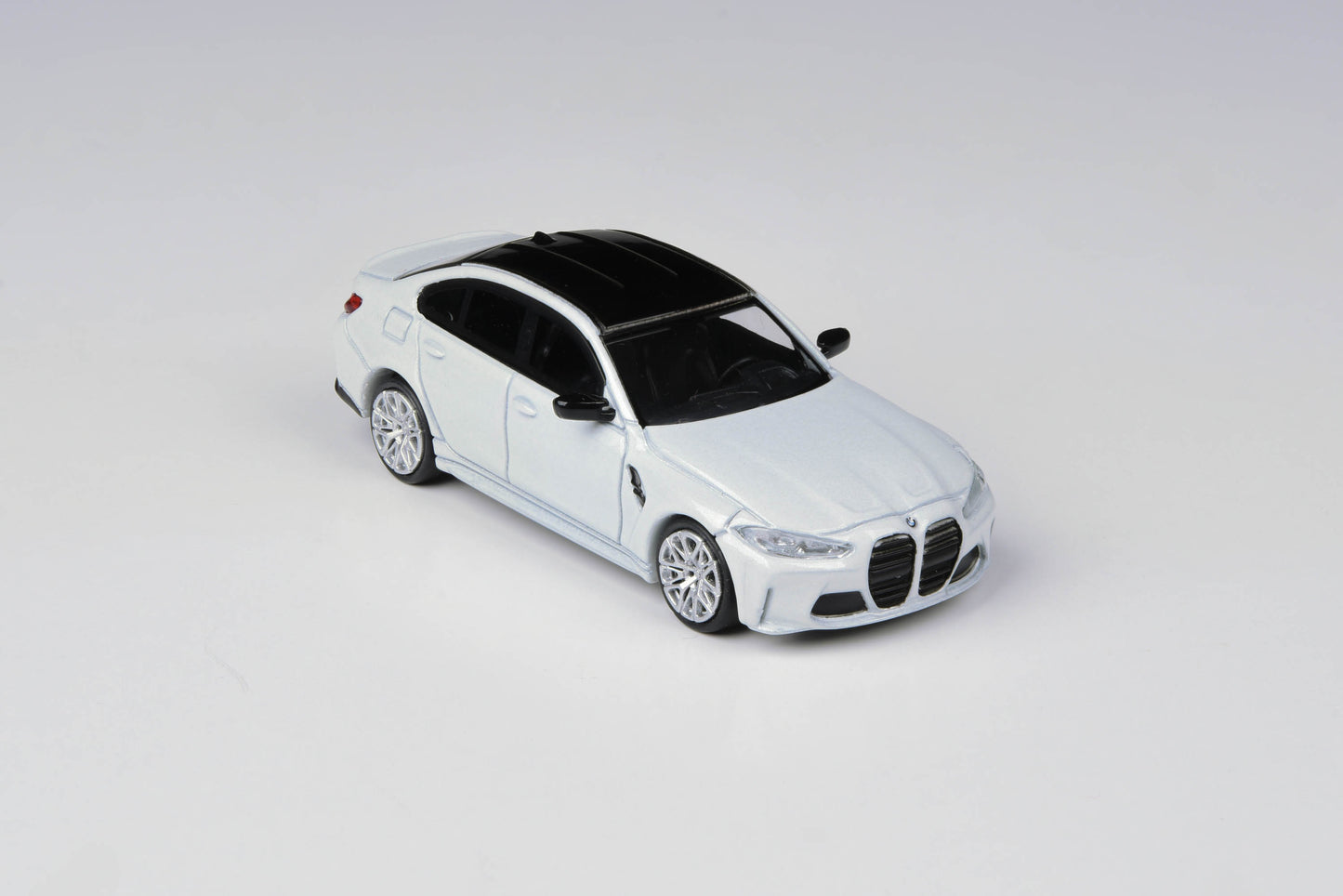 1:64 BMW M3 (G80) Isle of Man Green / Frozen Brilliant White