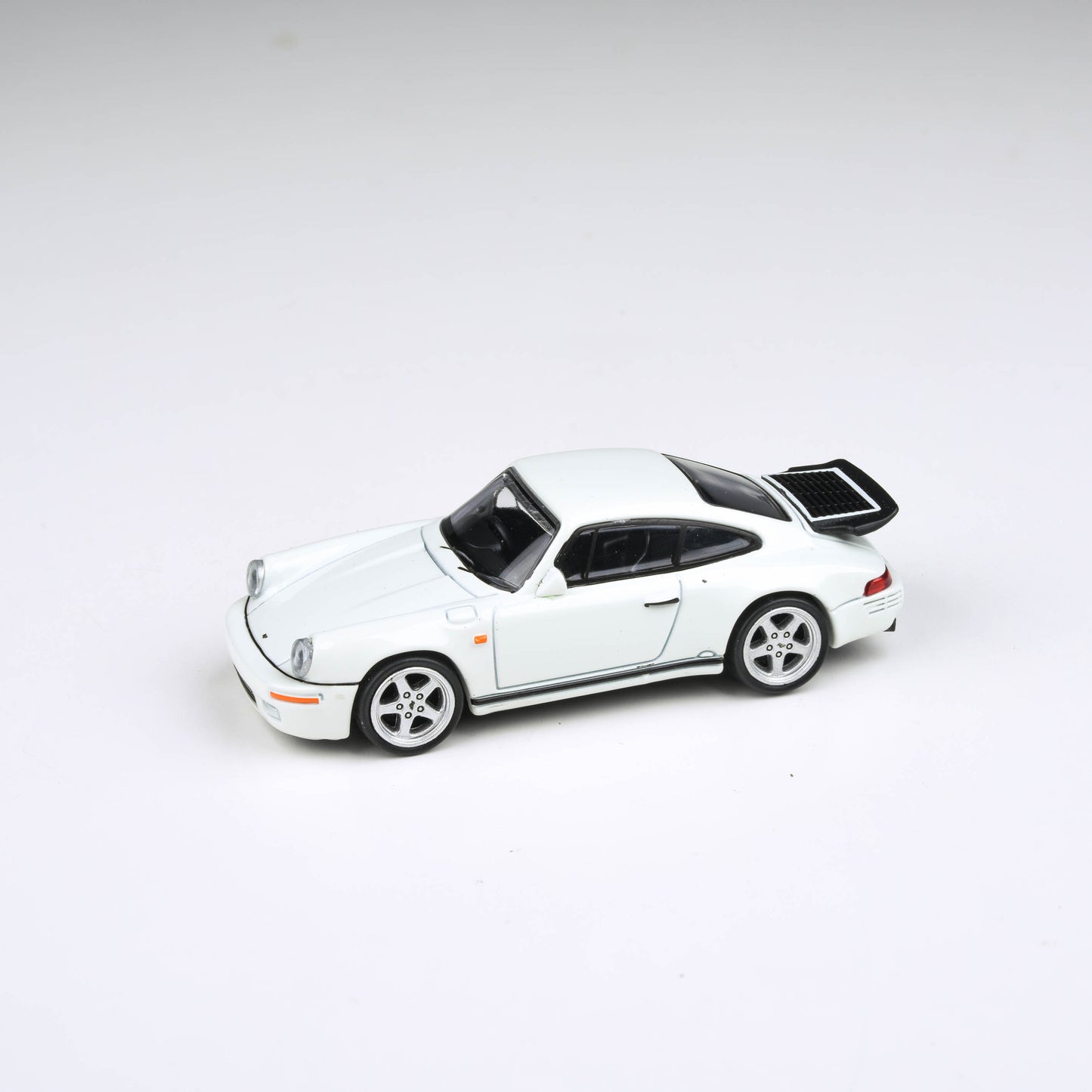 1:64 RUF 1987 CTR Yellowbird - Grand Prix White / Rennsport Racing Blue